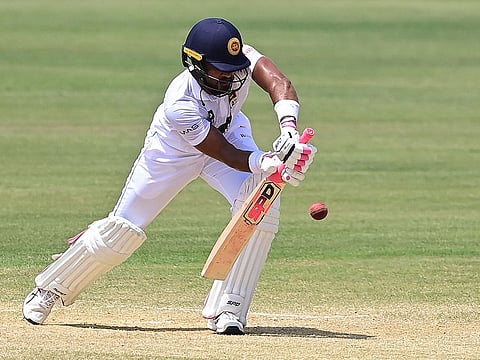 Sri Lanka's Dinesh Chandimal looks solid in defence during their second innings against Bangladesh on Thursday.