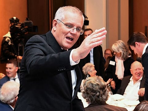 Australian prime minister Scott Morrison arrives at the Australia-Israel Chamber of Commerce luncheon as he campaigns in Melbourne on May 18, 2022, ahead on the May 21 general election.