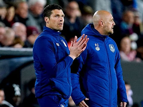 Burnley boss Mike Jackson (left) will be in for a tough match against Aston Villa tonight in the Premier League. A win would boost Burnley's battle to avoid the drop.