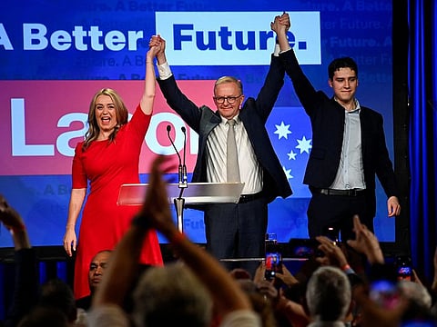Anthony Albanese, leader of Australia’s Labor Party, his partner Jodie Haydon and son Nathan Albanese, during a victory rally in Sydney, on May 21, 2022.