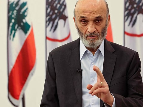 Samir Geagea, leader of the Christian Lebanese Forces party, speaks to an AFP journalist, during an interview at his residence in Maarab, north of the capital Beirut, on May 20, 2022.