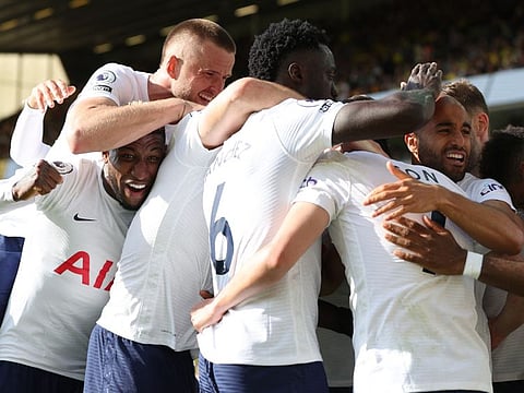 Tottenham Hotspur's Son Heung-min celebrates scoring their fourth goal with teammates.