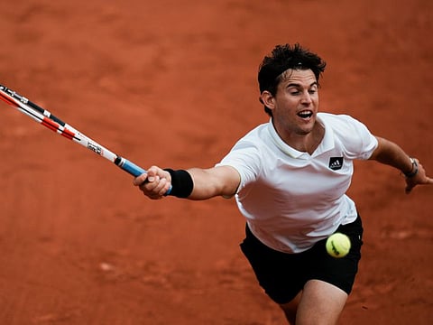 Austria's Dominic Thiem plays a shot against Bolivia's Hugo Dellien during their first round match at the French Open tennis tournament in Roland Garros stadium in Paris, France. Thiem lost 6-3 6-2 6-4.