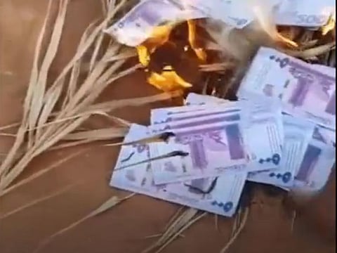 A video went viral, showing the man burning the fake pound notes.