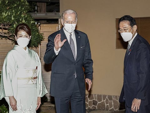 Fumio Kishida, Japan's prime minister (right) and his wife Yuko Kishida left welcome US President Joe Biden for a dinner event at the Happo-en garden in Tokyo on Monday.