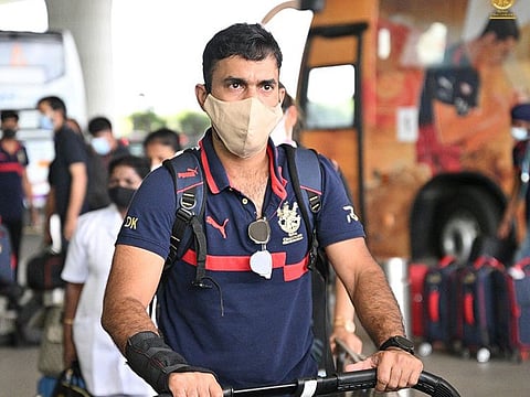 Man of the moment: Dinesh Karthik, whose blazing form as a finisher for RCB earned him a call-up to the Indian T20 team, on his way to Kolkata.