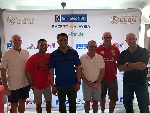 Winners of the five Divisions at the Emirates NBD Race to Malaysia Abu Dhabi Golf Club Qualifying Round, left to right: Damon Mitchell, Ricardo Wyckstandt, Faisal Saeed (Emirates NBD), Eric Hardman, Tony Okill and Michael Brogan.