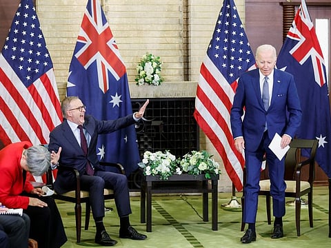 Biden jokingly pretends to walk away as Albanese talks about his broad experiences in the US years ago as a guest of a State Department programme, during a bilateral meeting alongside the Quad Summit at Kantei Palace in Tokyo on May 24, 2022.