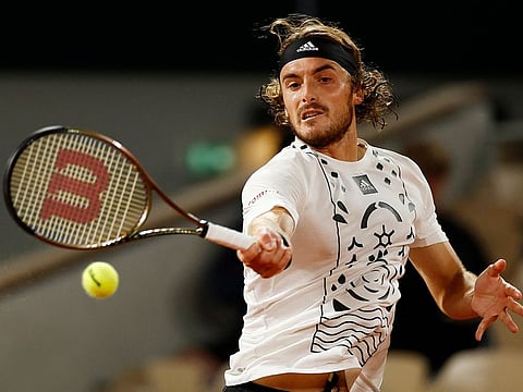 Greece's Stefanos Tsitsipas in action during his first round match against Italy's Lorenzo Musetti.