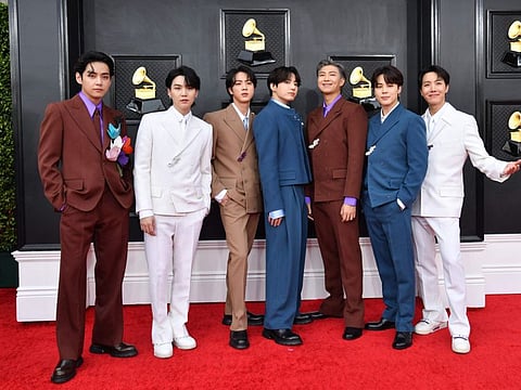 In this file photo taken on April 3, 2022, South Korean boy band BTS arrives for the 64th Annual Grammy Awards at the MGM Grand Garden Arena in Las Vegas.