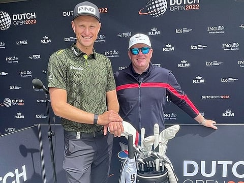 Dubai-based Adrian Meronk (left), tied third after 36 holes, with his caddie Stuart Beck at this week's Dutch Open on the DP World Tour.