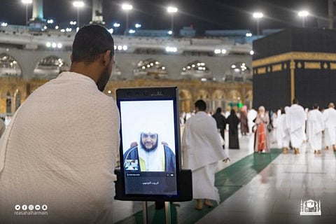 The robot offers visual services to Umrah pilgrims at the Grand Mosque.