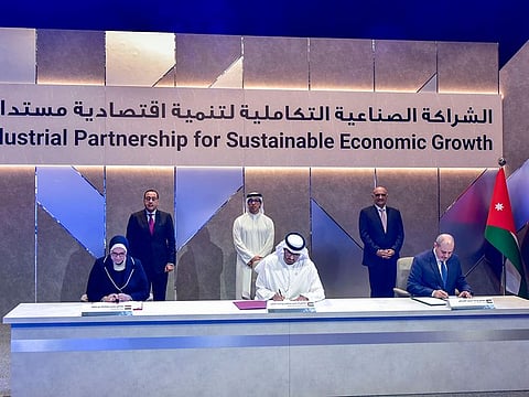 Dr. Sultan Al Jaber(center), Minister of Industry and Advanced Technology, Yousef Al-Shamali, Minister of Industry, Trade, and Supply, Jordan(right) and Nevein Essam Gamea, Minister of Trade and Industry, Egypt(left) in the presence of Sheikh Mansour bin Zayed, Deputy Prime Minister and Minister of Presidential Affairs, Bisher Al-Khasawneh, Prime Minister of Jordan, and Mostafa Madbouly, Prime Minister of Egypt, during the signing ceremony, at a high-level event for ‘Industrial Partnership for Sustainable Economic Growth’ relations between Jordan, UAE, and Egypt.