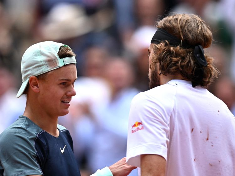 Denmark's Holger Rune and Greece's Stefanos Tsitsipas after their fourth round match.