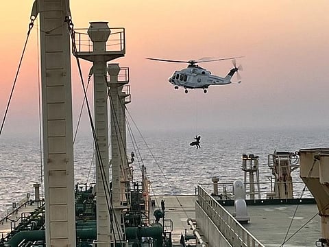 The police helicopter hovered over the ship as there was no helipad onboard