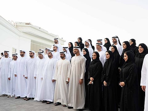 President His Highness Sheikh Mohamed bin Zayed Al Nahyan (centre) receives members of Martyrs' Families' Affairs Office.
