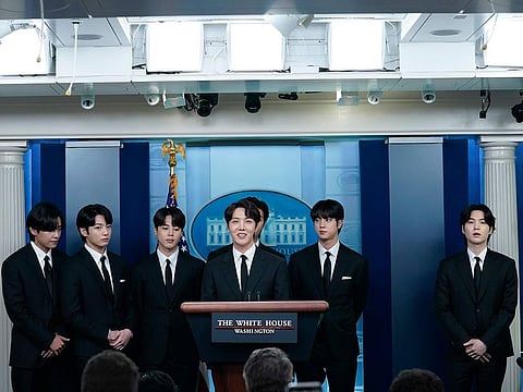 K-pop supergroup BTS member J-Hope speaks during the daily briefing at the White House, Tuesday, May 31, 2022, in Washington. BTS members are from left, V, Jungkook, Jimin, J-Hope, RM, obscured, Jin, and Suga.