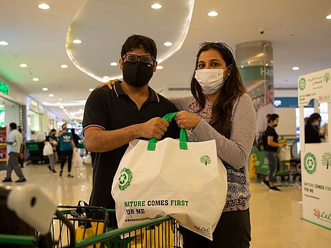 Shoppers with reusable bags at Lulu supermarket in Abu Dhabi's Mushrif Mall.