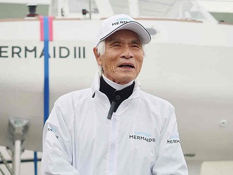 In this picture taken on January 24, 2022, Japanese sailor and adventurer Kenichi Horie addresses the media in front of his yacht before leaving for the United States, in Nishinomiya of Hyogo Prefecture.