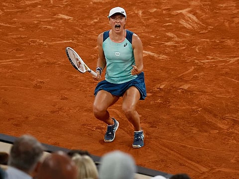 Pole star: Iga Swiatek reacts after winning her women's singles final against Coco Gauff in French Open final.