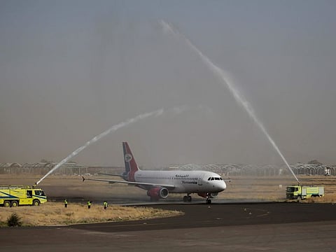 A Yemen Airways plane, the first commercial flight in six years from Sana'a, is greeted with a water spray salute at the Sana'a international airport, part of a truce in the county's grinding civil war, in a May, 16 photo.
