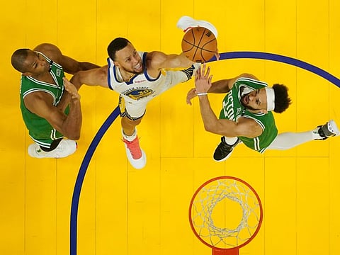 Stephen Curry of the Golden State Warriors shoots during the first half against the Boston Celtics in Game Two of the 2022 NBA Finals at Chase Center in San Francisco, California.