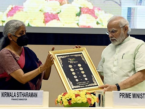 Prime Minister Narendra Modi with Union Finance Minister Nirmala Sitharaman releases special series of Re 1, Rs 2, Rs 5, Rs 10, and Rs 20 coins at the inauguration of the Iconic Week celebrations under the Azadi Ka Amrit Mahotsav (AKAM) at Vigyan Bhawan, in New Delhi on Monday, Jun 6, 2022.