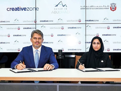 Lorenzo Jooris, CEO, Creative Zone and Mouza Obaid Al Nasiri, Executive Director SMEs Sector, ADDED, seen during the signing of the Setup in Abu Dhabi initiative