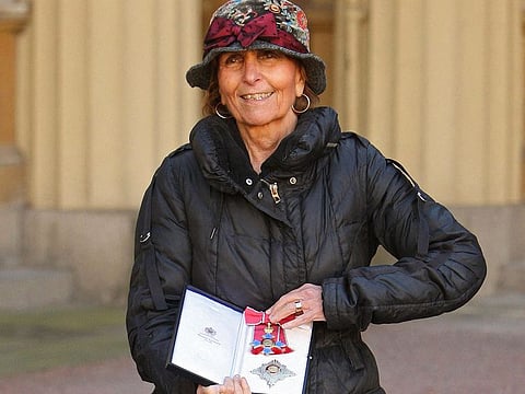 In this file photo taken on October 20, 2010 Portuguese artist Paula Rego poses with her DBE (Dame Commander of the Order of the British Empire), after she was awarded it by Britain's Queen Elizabeth II, during an Investiture ceremony at Buckingham Palace in London.