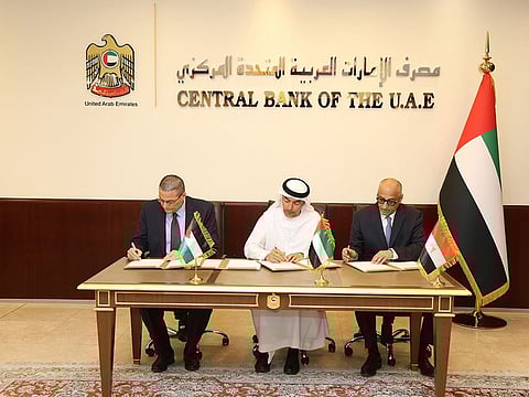 Khaled Mohamed Balama, Governor of the Central Bank of the UAE (CBUAE), Tarek Hassan Amer, Governor of the Central Bank of Egypt, and Dr. Adel Ahmad Al-Sharkas, Governor of the Central Bank of Jordan