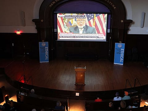 People watch the first hearing of the Select Committee to Investigate the January 6 Attack on the U.S. Capitol at the New York Society for Ethical Culture on June 09, 2022 in New York City.