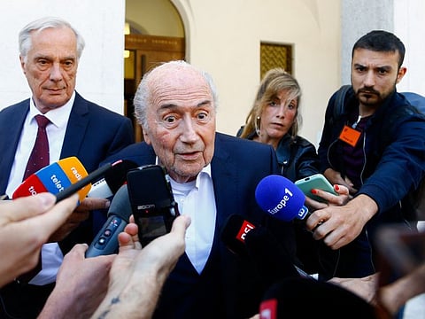 Former FIFA president Sepp Blatter speaks to the media in front of the Swiss Federal Criminal Court in Bellinzona, Switzerland.
