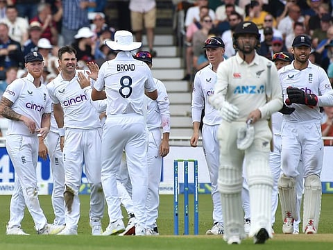 England's James Anderson (second left) celebrates after dismissing New Zealand's Devon Conway during the first day of the 2nd Test at Trent Bridge in Nottingham, England.
