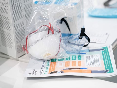 In this Thursday, April 16, 2020 photo, a view of masks and goggles, part of PPE, personal protective equipment, to avoid being infected or transmitting coronavirus, at the Nightingale Hospital North West set up in the Manchester Central Convention Complex in Manchester, northern England.