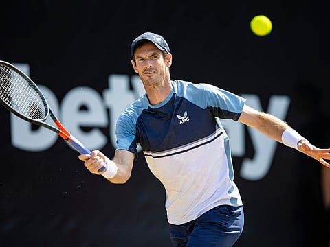 Britain's Andy Murray returns the ball to Australia's Nick Kyrgios during their ATP tennis semifinals match in Stuttgart, Germany.