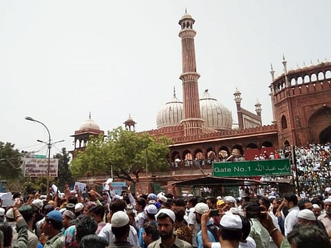 People stage a protest over alleged remarks by suspended BJP leader Nupur Sharma and expelled leader Naveen Jindal, at Jama Masjid, in Delhi on Friday.