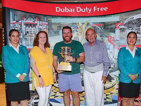 Ross Oates (centre), winner of Dubai Duty Free Golf Cup, being flanked by Dubai Duty Free’s Executive Vice Chairman & CEO, Colm McLoughlin and Sinead Al Sibai, EVP-Marketing.