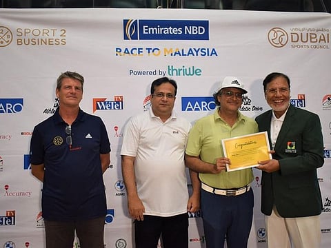 Humayun Kaleem (second right) received the Division 4 award from Captain of Sharjah Golf & Shooting Club Muhammad Shafiq (right) with Adil Matin (second left) and Russell Yeomans.