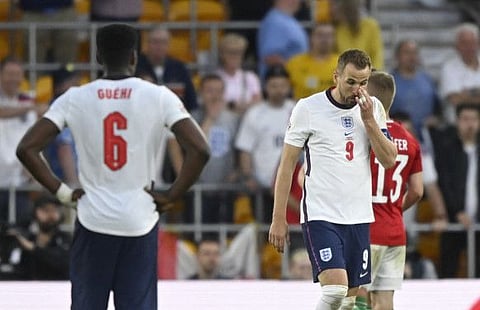 England's Harry Kane (right) looks dejected after the match against Hungary.