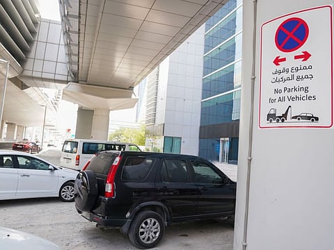 Vehicles parked under a Dubai Metro viaduct. RTA has cautioned motorists not to park their vehicles under Metro viaducts.