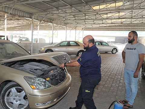 A car workshop in Ajman. Civil Defence authorities in the emirate have explained that most car fires are caused due to the failure to undertake proper and regular maintenance of the electrical and mechanical systems in a vehicle. Picture for illustrative purposes only.