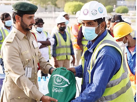 Dubai Police distributed gifts to workers after organised a sports day.