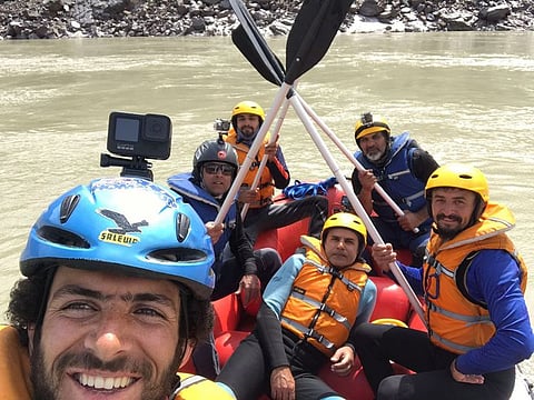 Wajahat Malik (centre) and the adventurers during the rafting expedition.