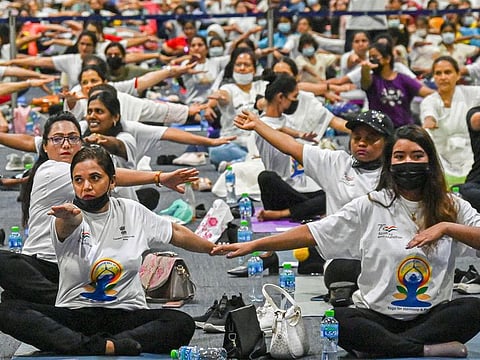 Hundreds of women and girls took centre stage at a massive celebration of the 8th International Day of Yoga at Dubai World Trade Centre on Sunday evening