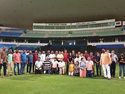 The organising team of the 8th International Day of Yoga event at the Zayed Cricket Stadium ahead of the big day.