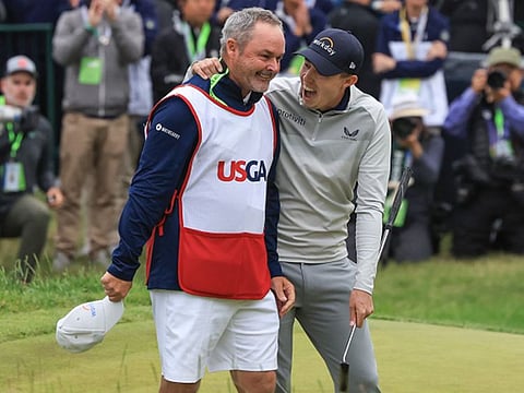 Matt Fitzpatrick (right) with caddy Billy Foster after winning the 2022 US Open