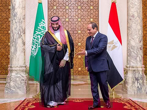 Egypt's President Abdel Fattah Al Sissi receiving Saudi Crown Prince Mohammed bin Salman at the presidential palace in the capital Cairo on June 21, 2022.