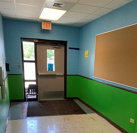 A view of the west entrance exterior door at the Robb Elementary School, where the deadliest US school mass shooting in nearly a decade took place, in Uvalde, Texas.