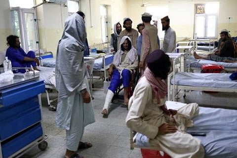Afghans, who were injured in the recent earthquake, receive treatment at a hospital ward in Sharana, Afghanistan, June 24, 2022.