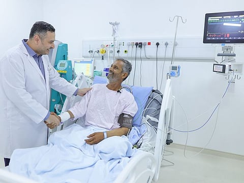 Dr Ashraf Abdelrehman with Lal Telu Ram Harkesh after successful treatment of blooding clotting in Abu Dhabi.